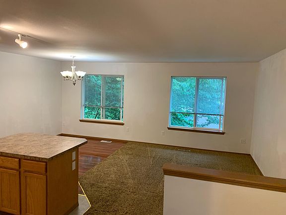 Open concept kitchen with plenty of natural light.