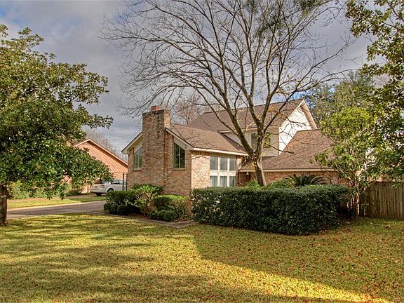 Roof is approximately 6 - 7 years old. This home is located on a LARGE lot of 13,600/sqft.  Look at all of this space!