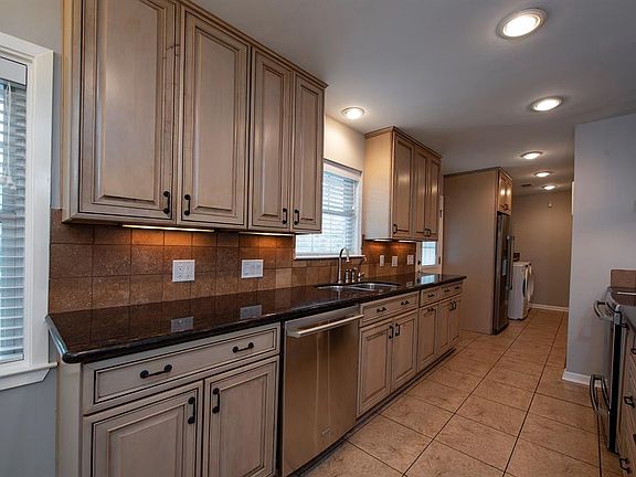 Updated kitchen with under cabinet lighting.