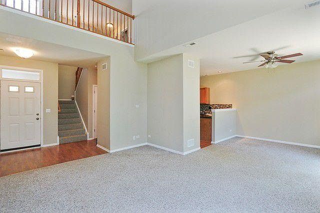Laminate hardwood floors in entry, hallway, half bath and kitchen. TWO hall closets for tons of storage. Large pantry. First floor laundry room with nice washer/dryer. Attached 2 car garage.