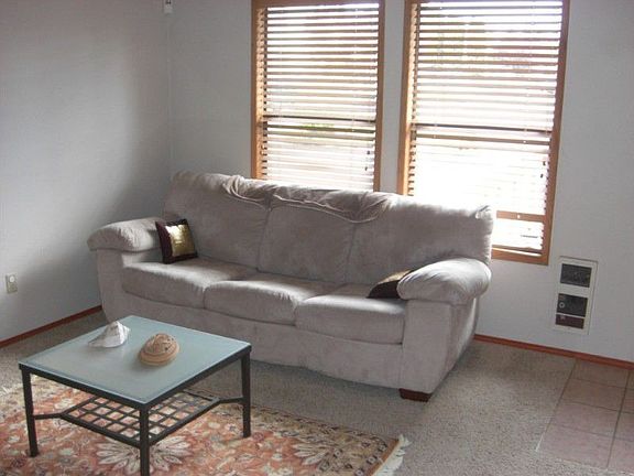 Living room area as you enter home.