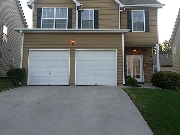 2 car garage and 2 car port