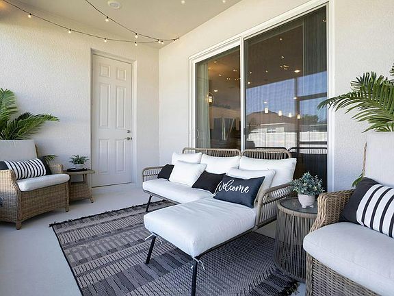 Your interior opens to desirable outdoor living space on your covered lanai - Waylyn by Highland Hom