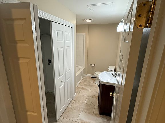 full bath off of kitchen with washer/dryer hookups