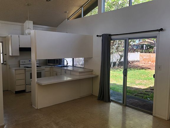 DINING ROOM, KITCHEN, BACK SLIDING DOOR TO BACK YARD