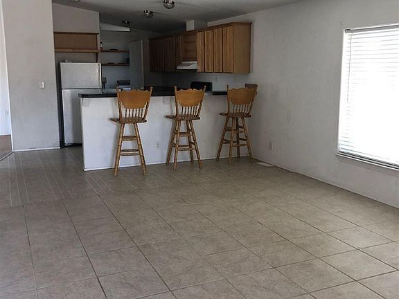 4th image of 69604 E 3rd Ave