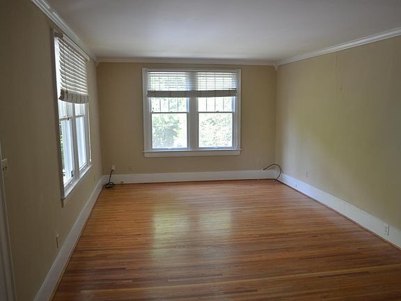 Spacious living room with hardwood floors