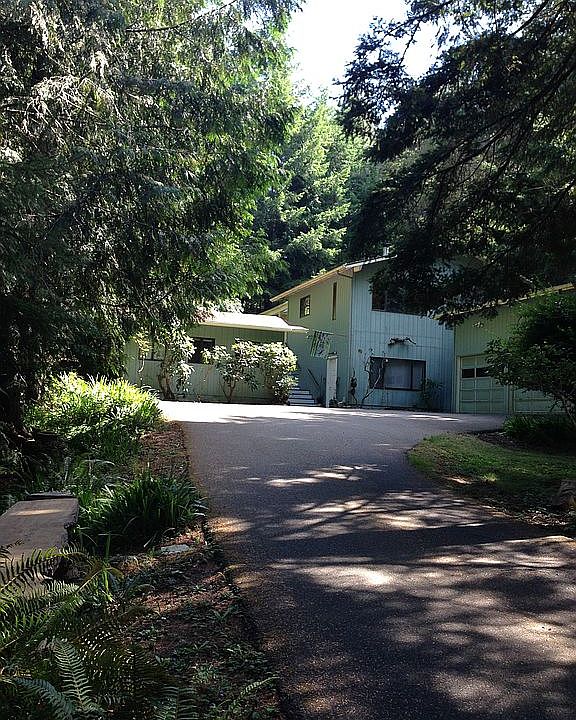 Home in park-like setting.