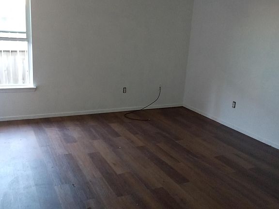 New flooring in all bedrooms. This is the master.