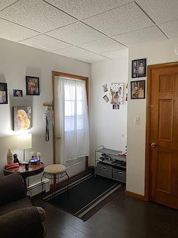 Living room front entrance with coat closet
