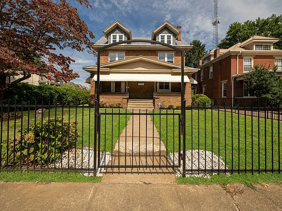 Wrought iron gate around entire property