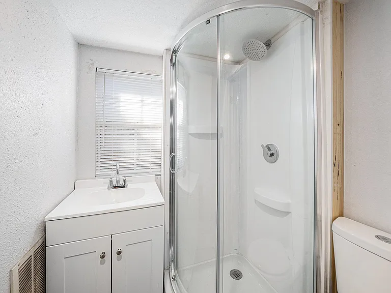 Downstairs bathroom with walk-in shower