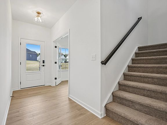Foyer featuring the AW Collection R Serene - Soft light and open space create a calm welcome.
