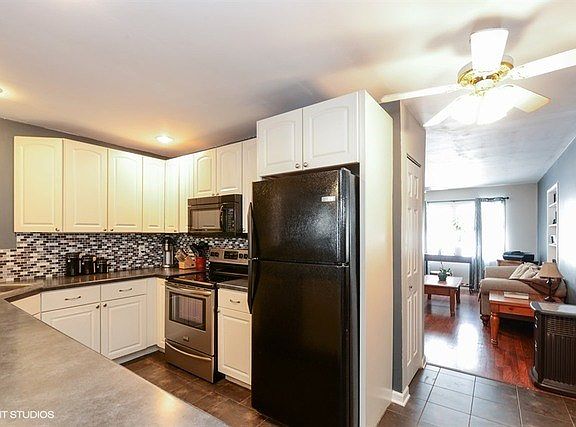 Cabinets with soft close touch and wonderful easy corner cabinet! Pantry closet, and all newer appli