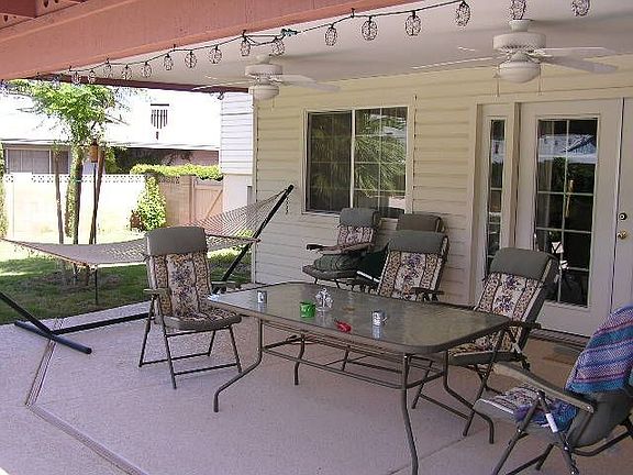 Covewred PAtio with Ceilings Fans and Mist System