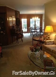 Living Room and Dining Room
						:
						View from the foyer as you enter the front door