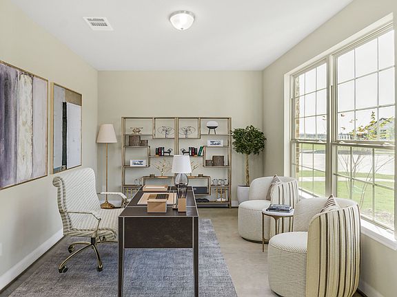 Study quietly nestled in the front of the home