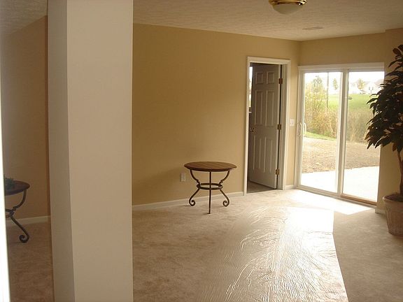 Lovely, neutral family room located on walk-out lower level.