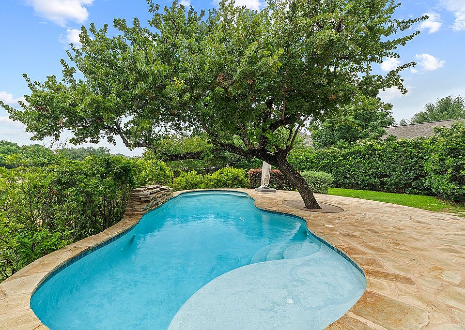 Pool w/ waterfall & decking