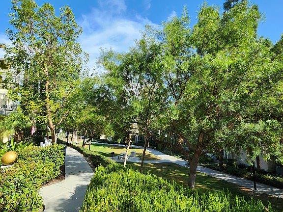 Greenbelt with seating and BBQ's right behind house