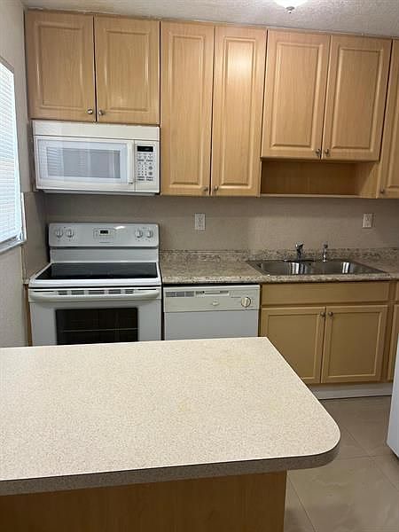 1st image of 110 SE 2nd St APT 105