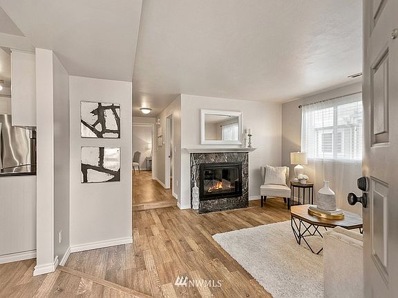 The stunningly executed remodel offers modern luxury and conveniences. Wide plank floors greet you at the entry and flow throughout most of the home.