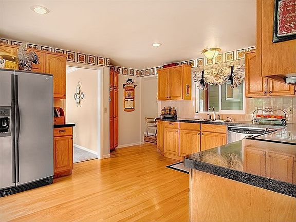 Hardwoods, ample storage & glass slider to deck.