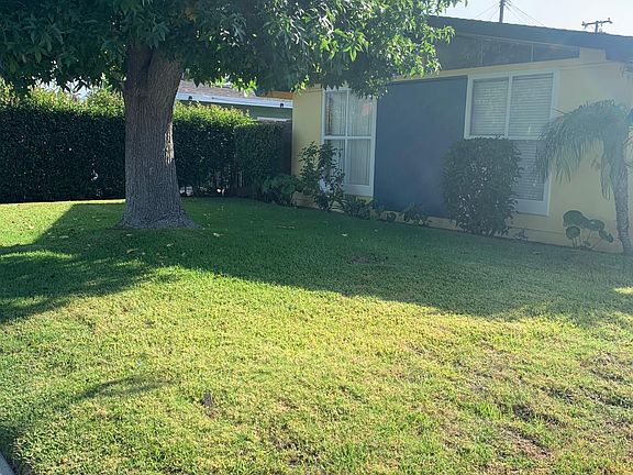 Large front and side yards with shade trees