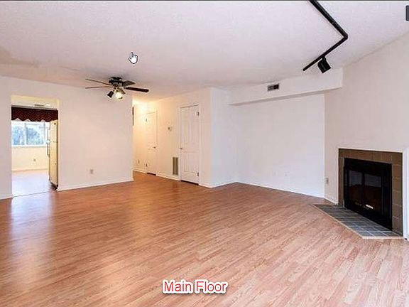 Main Floor - Living Room, Dining Room plus Fireplace