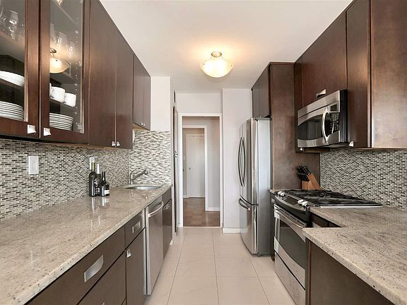 4th image of 6040 Blvd E APT 26C