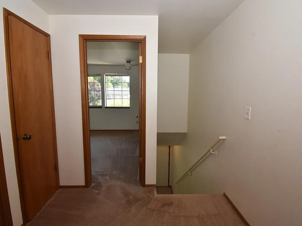 Upstairs hallway with 2 closets