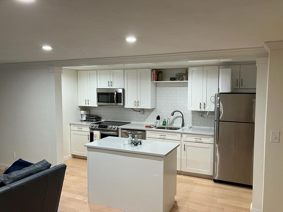 Amazing bright open-concept kitchen with island.