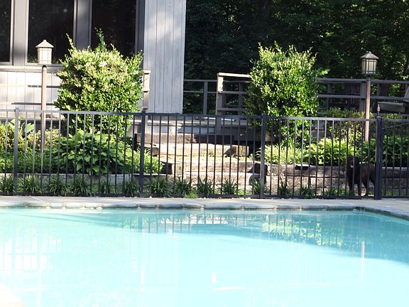 Pool and side of house