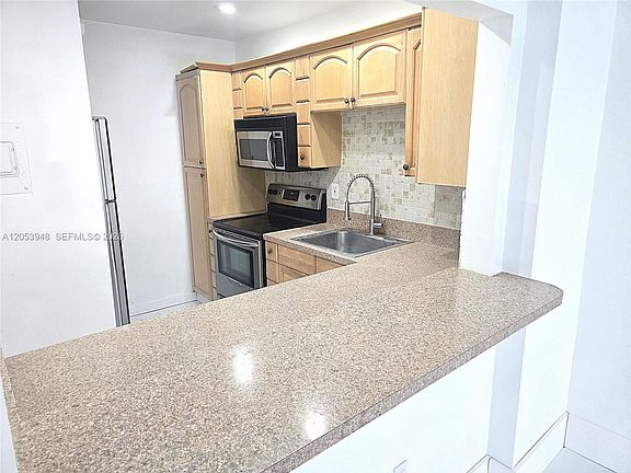 3rd image of 6070 W 18th Ave APT 213