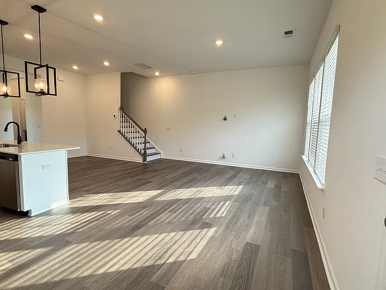 Bright, open-concept living and dining area with abundant natural light.