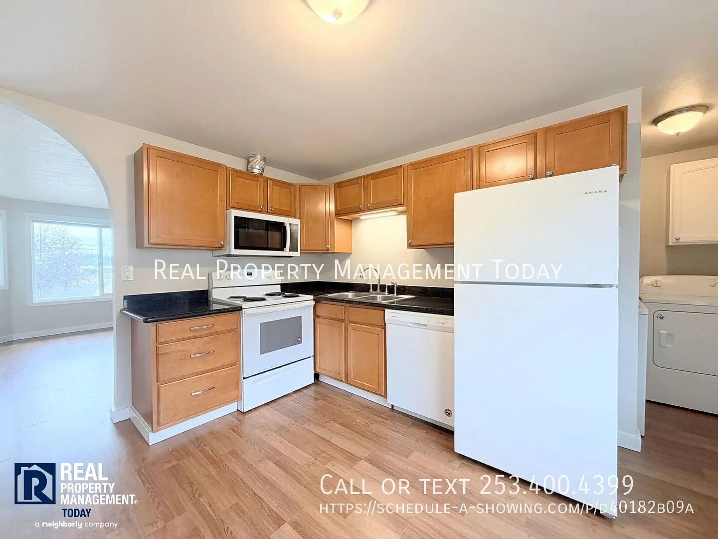 Ground-Floor 2-Bedroom Triplex Unit with Private Patio & Carport — Photo 2