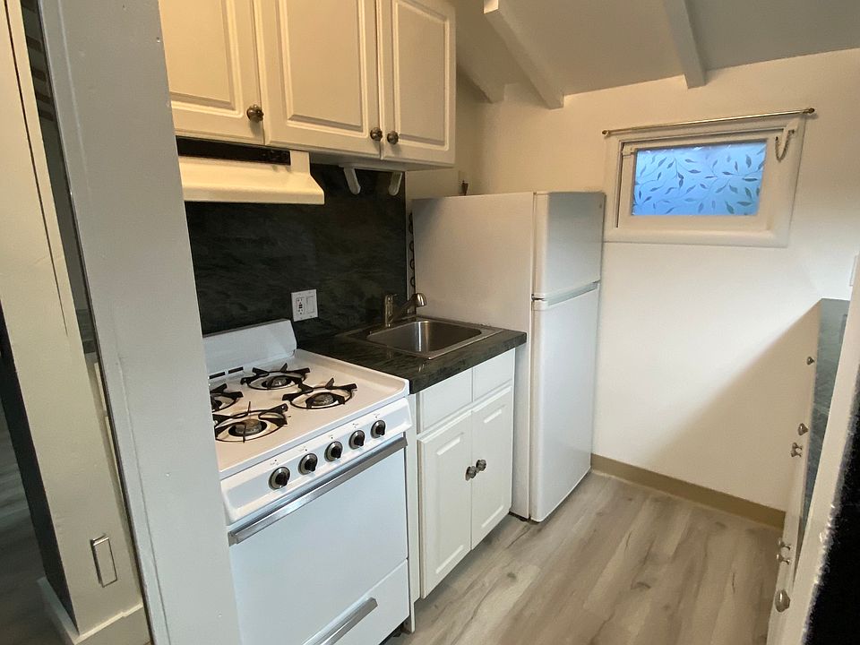 Kitchen view with vaulted ceiling