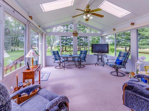16X13 SUNROOM COMPLETE WITH HEAT & AIR...GREAT PLACE TO ENJOY YOUR SERENE SURROUNDINGS!
