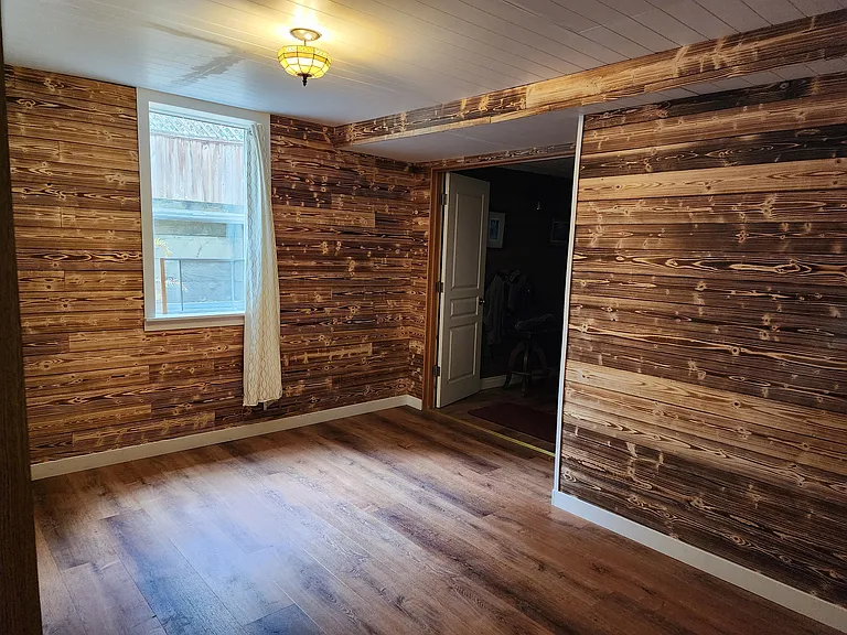smaller of 2-room basement suite