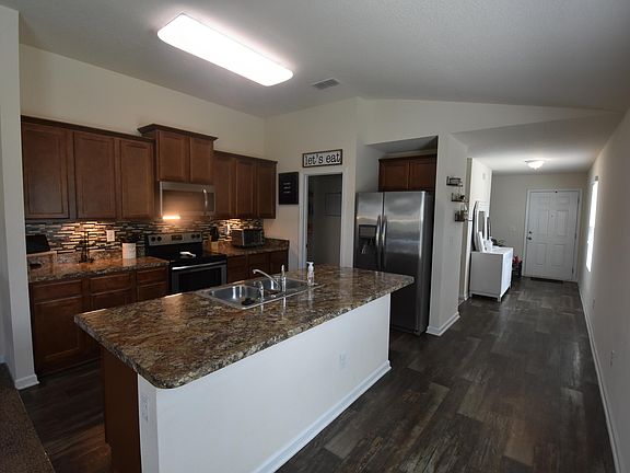 4th image of 65089 River Glen Pkwy