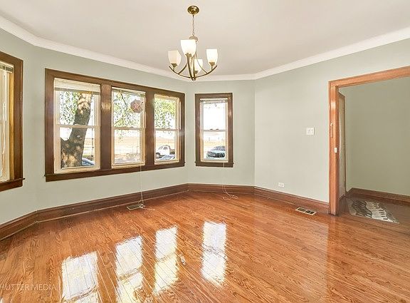 5th image of 1529 S Laramie Ave