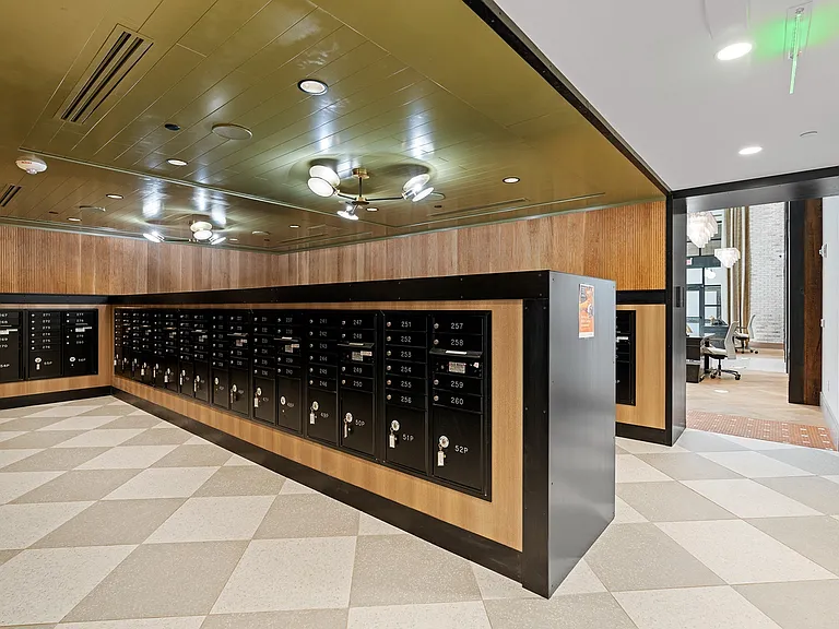 Stay organized and secure with a sleek, centralized mailroom.