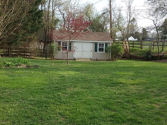 Storage shed. Beautiful yard