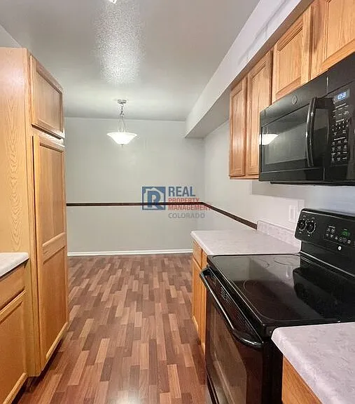 10784 W 63rd Pl #103 — Photo 11
