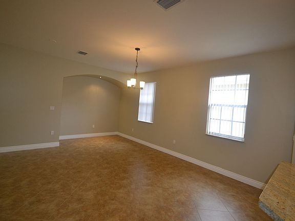 5th image of 540 NE 15th Ct