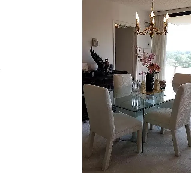 Dining room with sliding glass doors to your private balcony with great views.