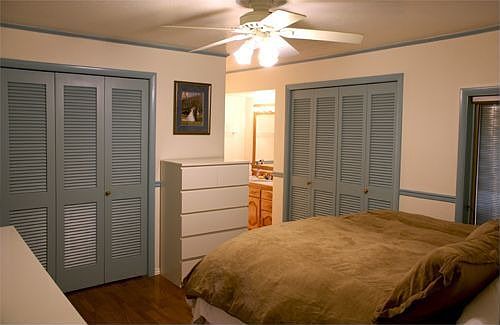 Master bedroom has hardwood floor, 2 closets, sink, linen closet, 3/4 bath