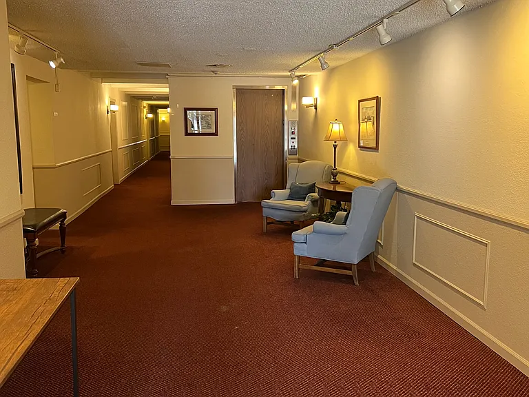 Lobby with large package pick up table to the left