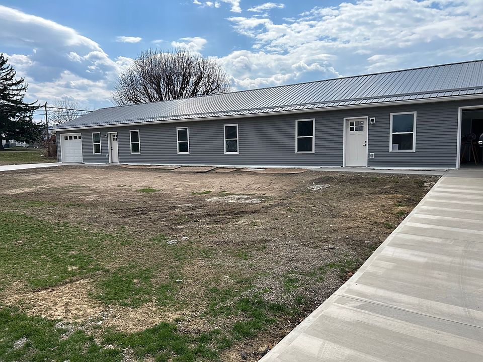 duplex. concrete driveways. plus garage. off street parking