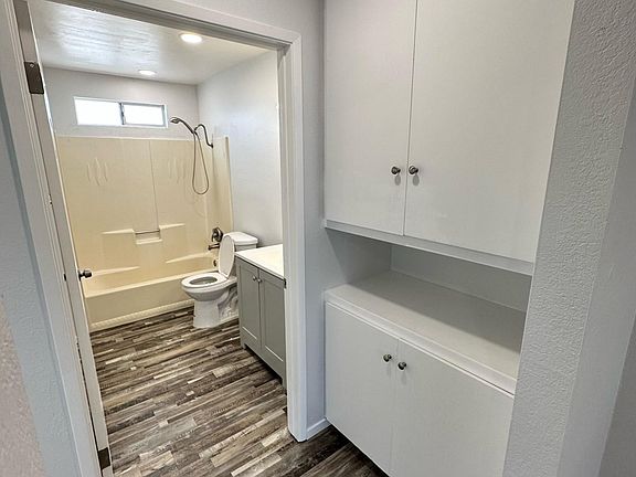 Hallway closets and Bathroom